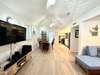 OPEN LIVING W/LARGE FLAT SCREEN TV