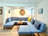ADJACENT LIVING AREA W/LARGE SECTIONAL