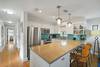 UPDATED KITCHEN W/BAR SEATING FOR 3 UPDATED KITCHEN W/BAR SEATING FOR 3