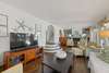 OPEN LARGE LIVING ROOM OFF FRONT ENTRANC E, LARGE FLAT SCREEN TV
