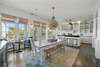 GENEROUS, FULLY EQUIPPED KITCHEN AND DINING AREA