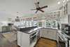 KITCHEN W/SLEEK BLACK COUNTERS, ALL STAINLESS STEEL APPLIANCES