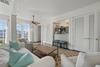 SITTING AREA ALTERNATE VIEW TO WALL OF WINDOWS W/SHADES SITTING AREA ALTERNATE VIEW TO WALL OF WINDOWS W/SHADES