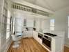 OPEN SECOND LEVEL DEVOTED TO LIVING, KITCHEN AND DINING