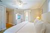 FIRST FLOOR KING PRIMARY BEDROOM WITH FLAT SCREEN TV FIRST FLOOR KING PRIMARY BEDROOM WITH FLAT SCREEN TV