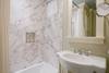 ENSUITE BATHROOM WITH MARBLE TUB/SHOWER COMBINATION ENSUITE BATHROOM WITH MARBLE TUB/SHOWER COMBINATION