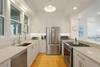 FULLY EQUIPPED KITCHEN WITH STAINLESS STEEL APPLIANCES FULLY EQUIPPED KITCHEN WITH STAINLESS STEEL APPLIANCES
