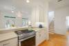 FOUR BURNER GAS STOVE, FACING LIVING FOUR BURNER GAS STOVE, FACING LIVING