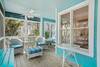 GENEROUS FURNISHED SCREENED FRONT PORCH AT ENTRANCE GENEROUS FURNISHED SCREENED FRONT PORCH AT ENTRANCE