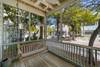 LARGE SCREENED IN FRONT PORCH WITH PORCH SWING LARGE SCREENED IN FRONT PORCH WITH PORCH SWING