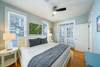 FIRST FLOOR KING BEDROOM WITH PORCH ACCESS FIRST FLOOR KING BEDROOM WITH PORCH ACCESS