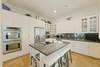 KITCHEN WITH BARTOP SEATING FOR THREE PEOPLE KITCHEN WITH BARTOP SEATING FOR THREE PEOPLE