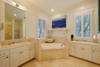 FULL BATH WITH SOAKING TUB AND DOUBLE VANITIES FULL BATH WITH SOAKING TUB AND DOUBLE VANITIES