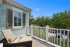 BALCONY OFF SECOND LEVEL WITH LOUNGE SEATING BALCONY OFF SECOND LEVEL WITH LOUNGE SEATING