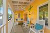 OPEN FURNISHED FRONT PORCH WITH 3 CHAIRS AND A PORCH SWING OPEN FURNISHED FRONT PORCH WITH 3 CHAIRS AND A PORCH SWING