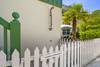 OUTDOOR SHOWER WITH PICKET FENCE ENCLOSURE OUTDOOR SHOWER WITH PICKET FENCE ENCLOSURE