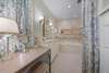 HER MASTER BATHROOM WITH VANITY AREA