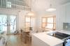 DINING AREA FOR FOUR AND FULLY EQUIPPED KITCHEN ON FIRST LEVEL DINING AREA FOR FOUR AND FULLY EQUIPPED KITCHEN ON FIRST LEVEL