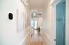 HALLWAY LEADING TO BEDROOMS AND A HALL, FULL BATH