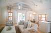 OPEN LIVING WITH AMPLE SEATING FOR ALL