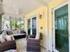 OPEN PORCH WITH SECTIONAL AND SEATING OFF KING
