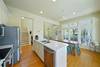 FIRST FLOOR COMBINED DINING, KITCHEN, & LIVING FIRST FLOOR COMBINED DINING, KITCHEN, & LIVING