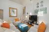 LARGE CENTRAL SOFA AND TWO CLUB CHAIRS LARGE CENTRAL SOFA AND TWO CLUB CHAIRS