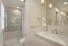 KING PRIVATE BATH DUAL VANITIES & GLASS ENCLOSED SHOWER