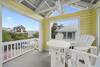ADJACENT COVERED TOWER DECK W/BAR SEATING ADJACENT COVERED TOWER DECK W/BAR SEATING