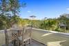 OPEN AIR DECK WITH BAR SEATING FOR FOUR, PERFECT FOR HAPPY HOUR