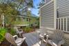 REAR OUTDOOR SEATING ON DECK BY GRILL REAR OUTDOOR SEATING ON DECK BY GRILL