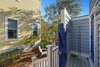 ENCLOSED OUTDOOR SHOWER OFF REAR DECK, PERFECT FOR SANDY DAYS