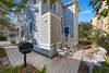 REAR DECK W/CHARCOAL GRILL & SEATING REAR DECK W/CHARCOAL GRILL & SEATING