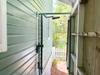 ENCLOSED PRIVATE OUTDOOR SHOWER AT REAR OF HOME ENCLOSED PRIVATE OUTDOOR SHOWER AT REAR OF HOME