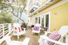 REAR DECK WITH DINING AND SEATING AREAS REAR DECK WITH DINING AND SEATING AREAS