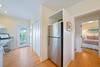 KITCHEN W/REAR PORCH ACESS AND ADJACENT LAUNDRY CLOSET KITCHEN W/REAR PORCH ACESS AND ADJACENT LAUNDRY CLOSET