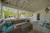 FURNISHED FRONT PORCH WITH SOFA AND ROCKERS