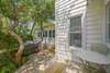 OUTDOOR DINING FOR TWO OVERLOOKING BACKYARD & GRILL AREA