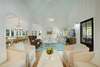 OPEN LIVING OFF ENTRY WITH SLIPCOVER SEATING