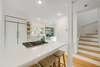 RENOVATED KITCHEN W/BAR TOP SEATING FOR 3