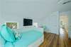 ALTERNATE VIEW, 1 DAYBED & LARGE FLATSCREEN TV