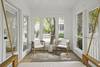 SCREENED FRONT PORCH WITH SEATING AND BED SWING SCREENED FRONT PORCH WITH SEATING AND BED SWING