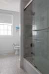 HALLWAY FULL BATH WITH MARBLE TUB & SHOWER COMBO