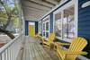 ADIRONDACK SEATING ON PORCH OVERLOOKING YARD ADIRONDACK SEATING ON PORCH OVERLOOKING YARD
