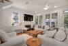 OPEN LIVING W FLATSCREEN, SEATING, AND SOUNDBAR OPEN LIVING W FLATSCREEN, SEATING, AND SOUNDBAR