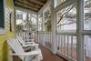 REAR SCREENED IN PORCH W/ADIRONDACK SEATING REAR SCREENED IN PORCH W/ADIRONDACK SEATING
