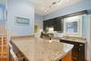 FULLY EQUIPPED KITCHEN WITH BARTOP SEATING FULLY EQUIPPED KITCHEN WITH BARTOP SEATING