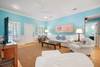 OPEN LIVING WITH SLIPCOVER SEATING AND FLATSCREEN OPEN LIVING WITH SLIPCOVER SEATING AND FLATSCREEN