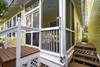 REAR PORCH W/OUTDOOR SHOWER AT STEPS REAR PORCH W/OUTDOOR SHOWER AT STEPS