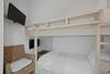 TWIN BUNK BEDROOM TWO, EACH W/LED TV TWIN BUNK BEDROOM TWO, EACH W/LED TV